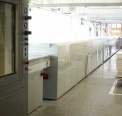 Stříkací automat s UV sušícím tunelem